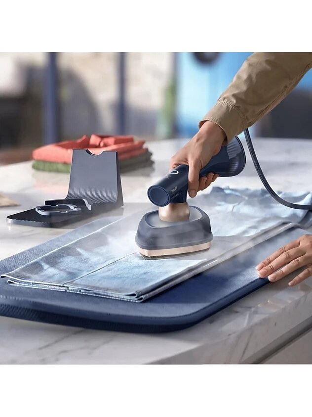 Philips Steam Iron with Soft Board | OneTurn GC215/20 | Steam Iron | 1800 W | Water tank capacity 200+300 ml | Continuous steam 45 g/min | Steam boost performance 90 g/min | Blue 5 Philips Steam Iron with Soft Board | OneTurn GC215/20 | Steam Iron | 1800 W | Water tank capacity 200+300 ml | Continuous steam 45 g/min | Steam boost performance 90 g/min | Blue 5